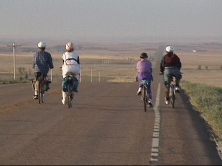 Dunning Family head down Rose Hill on Bike 
Trek, Photo by Roland Blanks