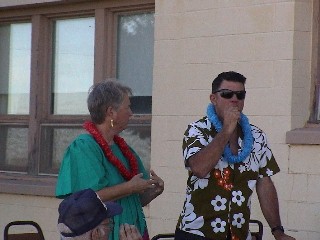 Marilyn & Art Widhalm join in at the Luau, Photo by 
Roland Blanks